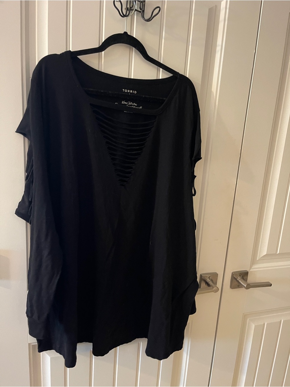 torrid Black Long-Sleeve Top with Slashed V-Neck Cutouts & along each arm.